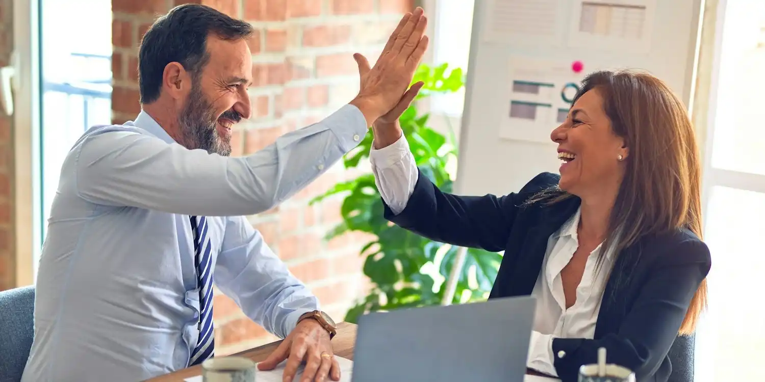 People high-fiving